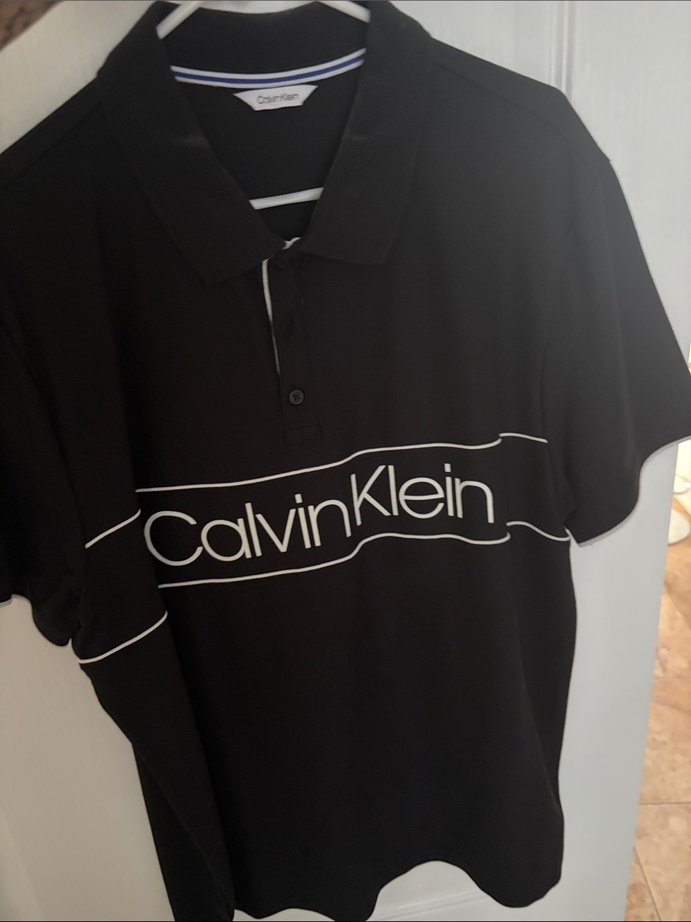Calvin Klein Black Polo with White Logo Stripe